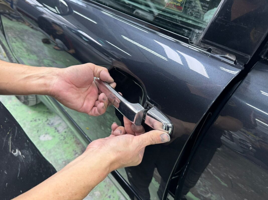 The Lexus RX400h during reassembly after painting and polishing.