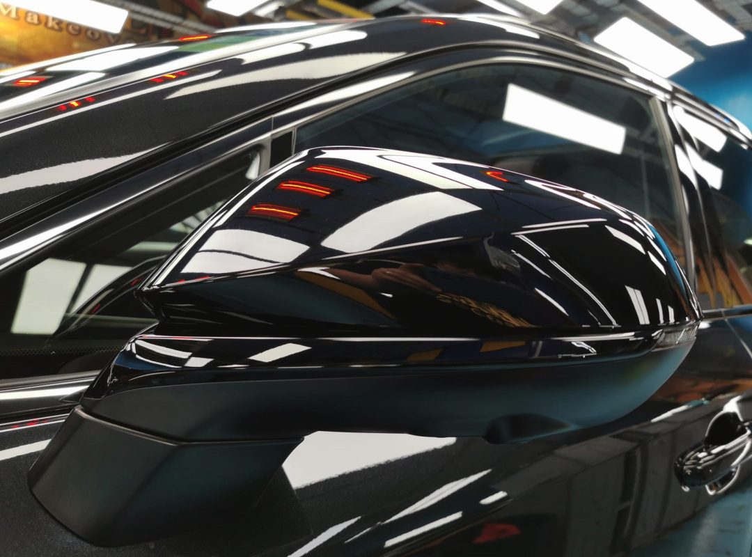 Side panel of the Lexus RX500h with the titanium finish locked in.
