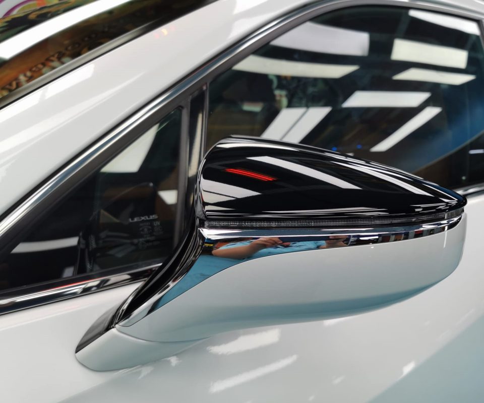 Side panel of the Lexus UX250h with the titanium finish locked in.