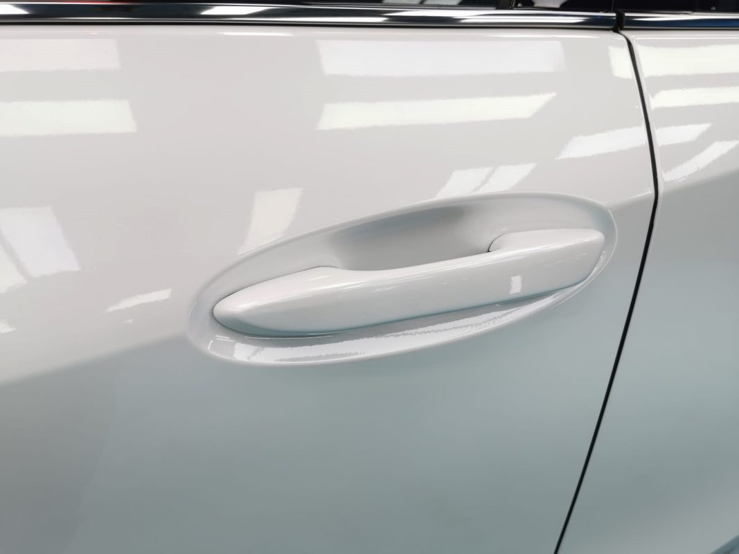 Front three-quarter view of the Lexus UX250h after coating.