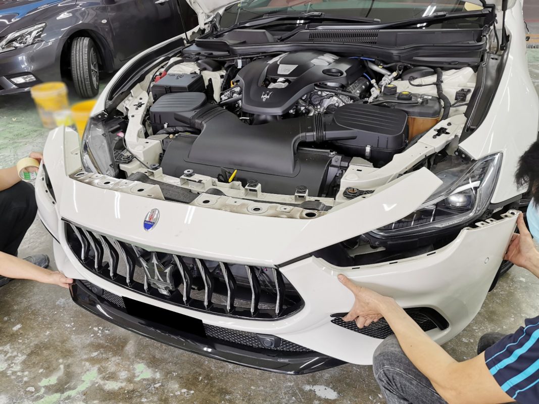Parts being dismantled from the Maserati Ghibli before prep work.