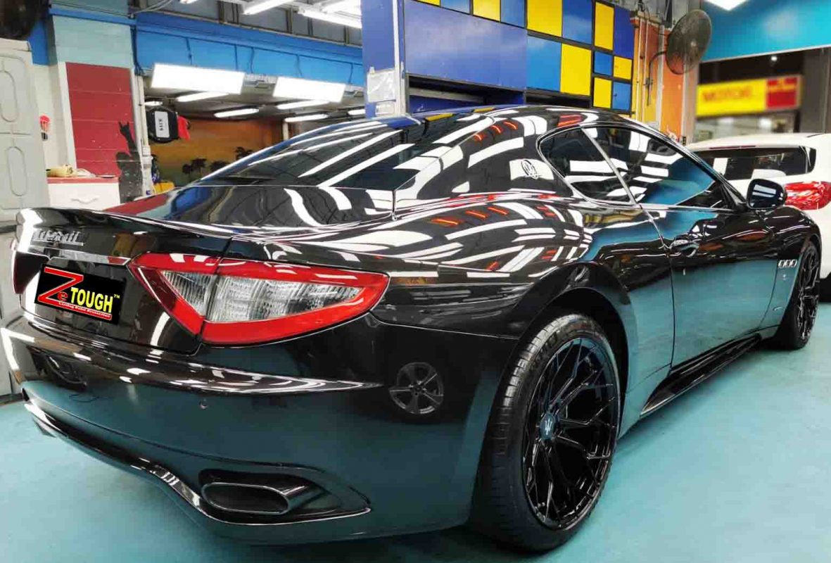 Rear quarter of the Maserati GranTurismo, glossy and protected.