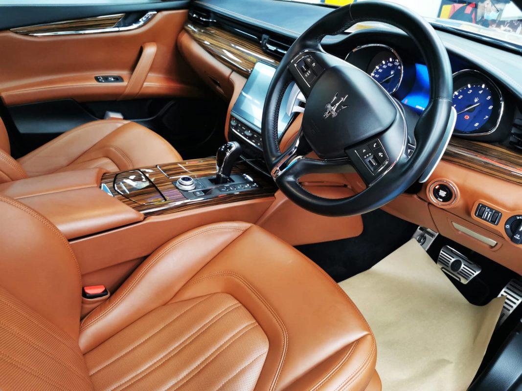 The Maserati Quattroporte GranLusso parked in the workshop, freshly coated.