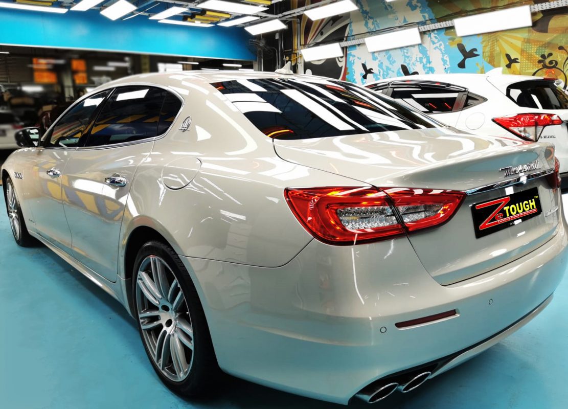 Rear quarter of the Maserati Quattroporte GranLusso, glossy and protected.