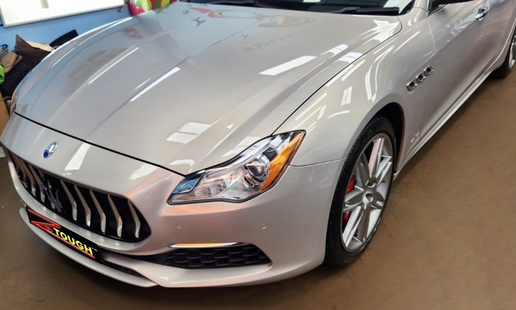 The Maserati Quattroporte from a side angle after the ceramic coating.