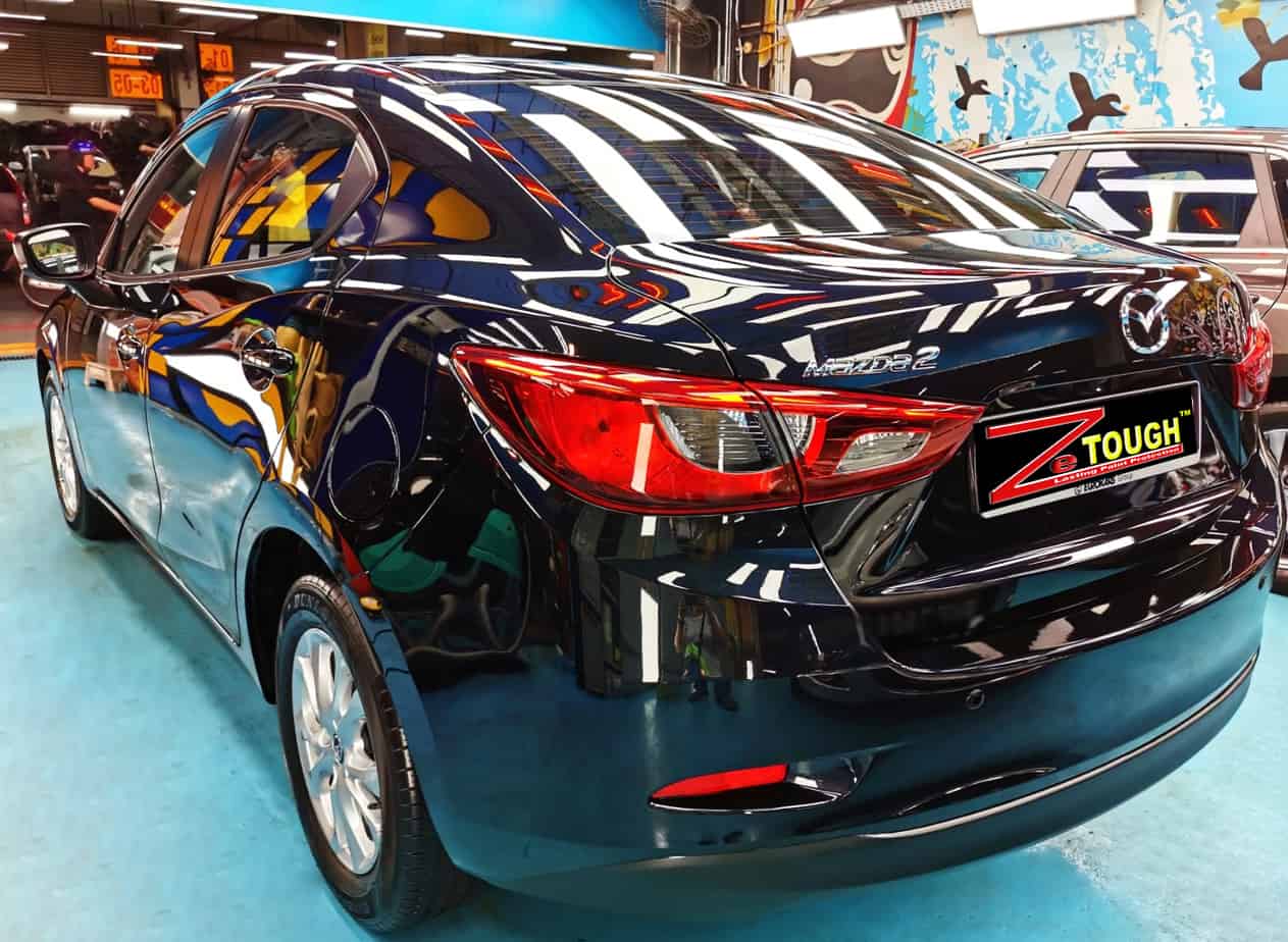 Rear quarter of the Mazda 2, glossy and protected.