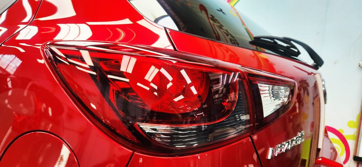 Rear quarter of the Mazda 2, glossy and protected.