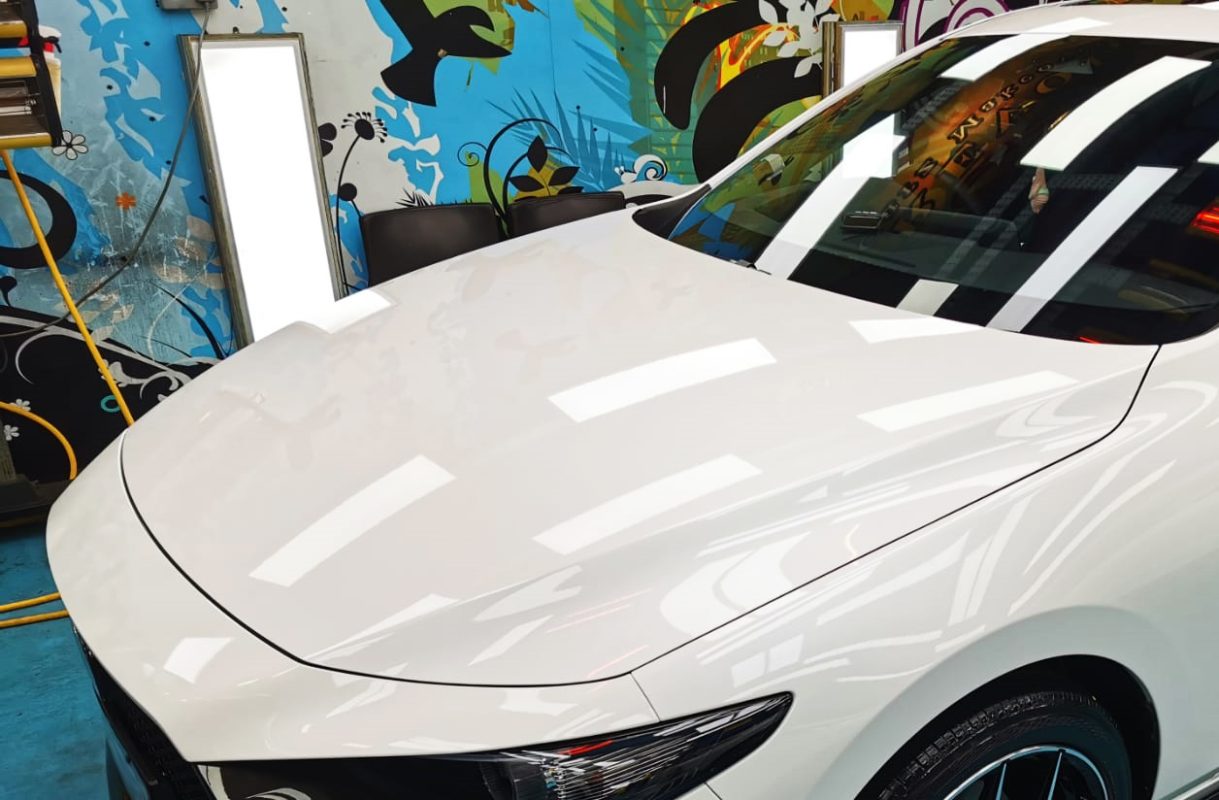 The Mazda 3 from a side angle after the titanium coating.