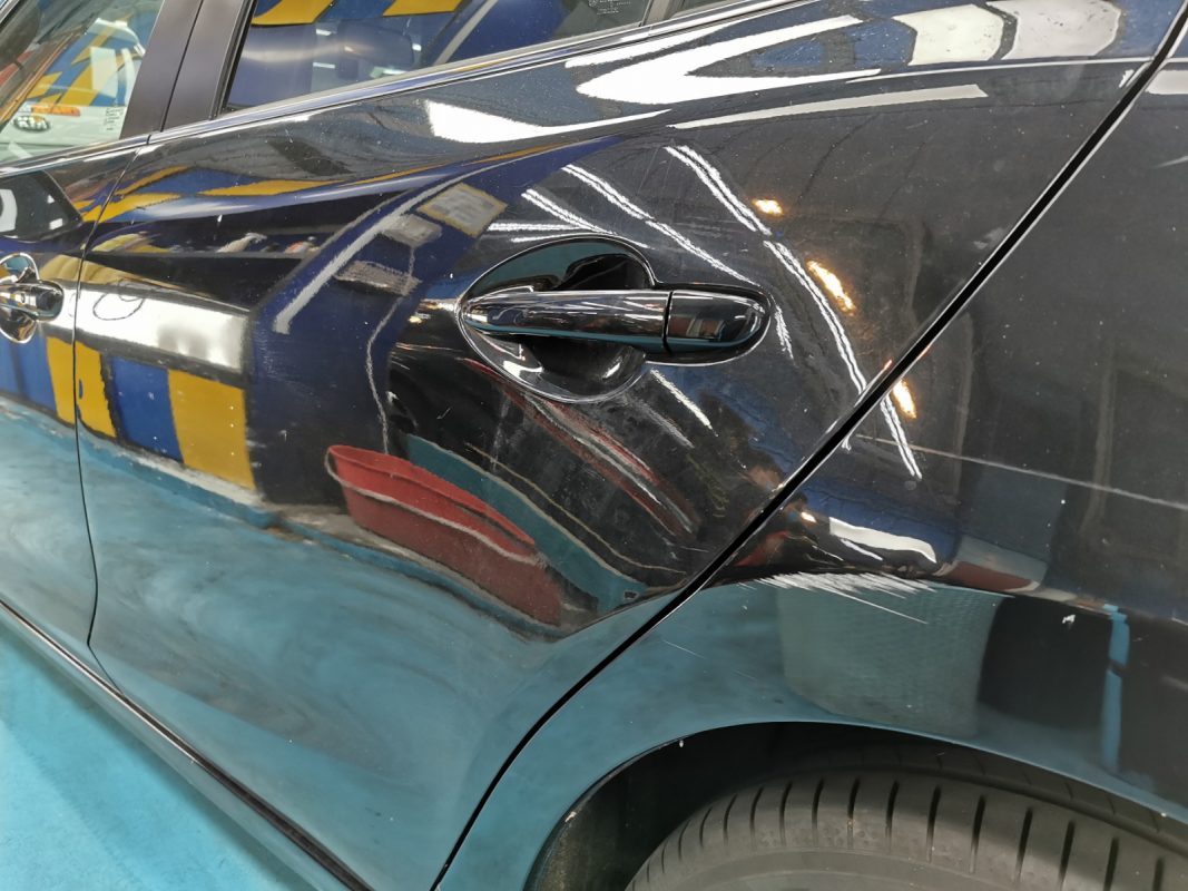Front three-quarter view of the Mazda 3 after coating.