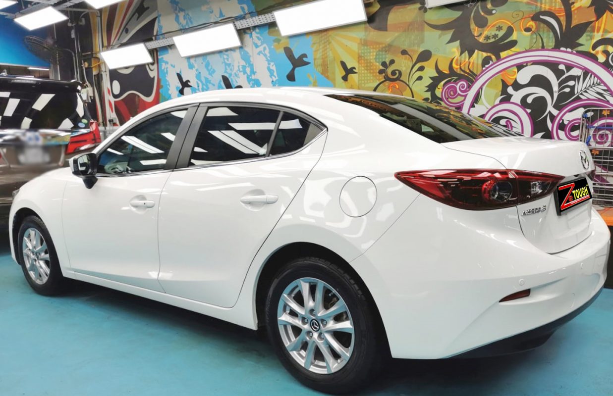 Rear quarter of the Mazda 3, glossy and protected.