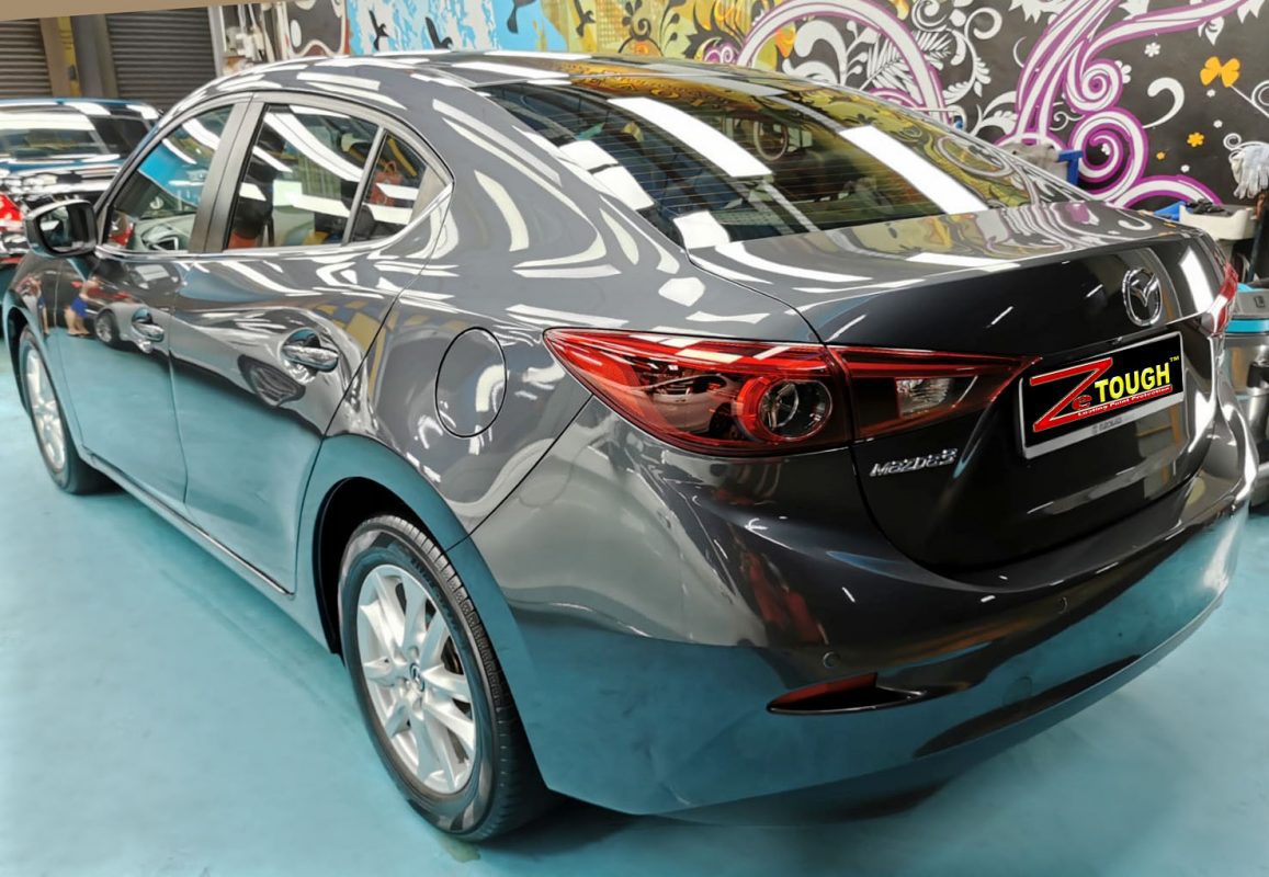 Rear quarter of the Mazda 3, glossy and protected.