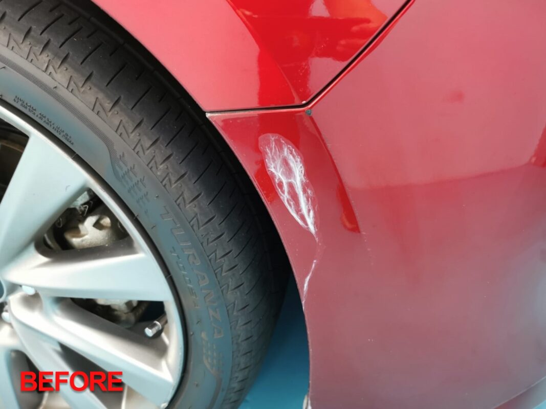 The Mazda 3 during its respray at Revol Carz.