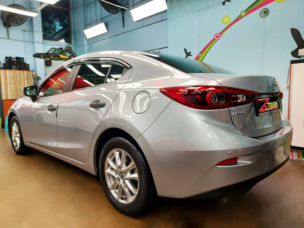 Rear quarter of the Mazda 3, glossy and protected.