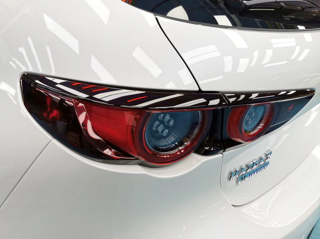 Rear quarter of the Mazda 3, glossy and protected.