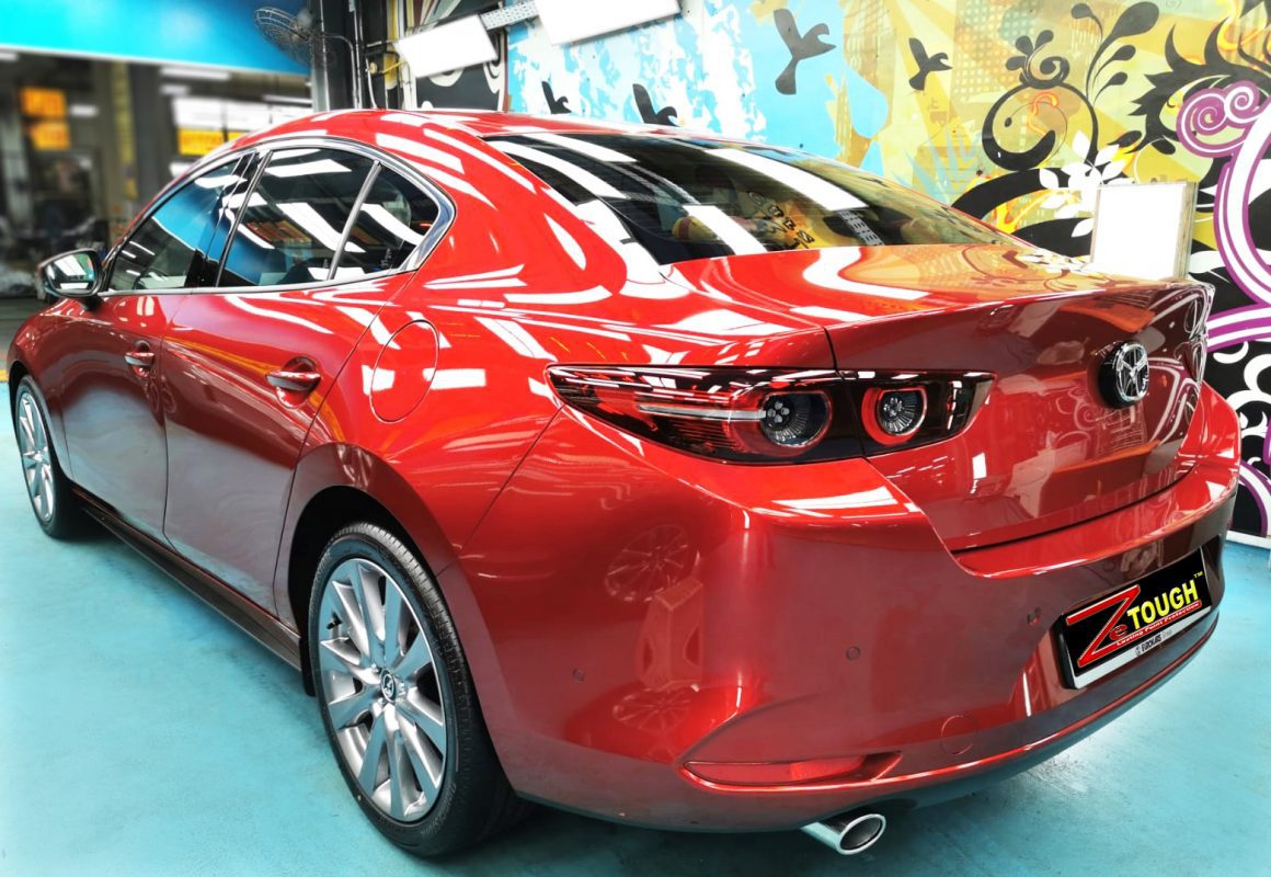 Rear quarter of the Mazda 3, glossy and protected.