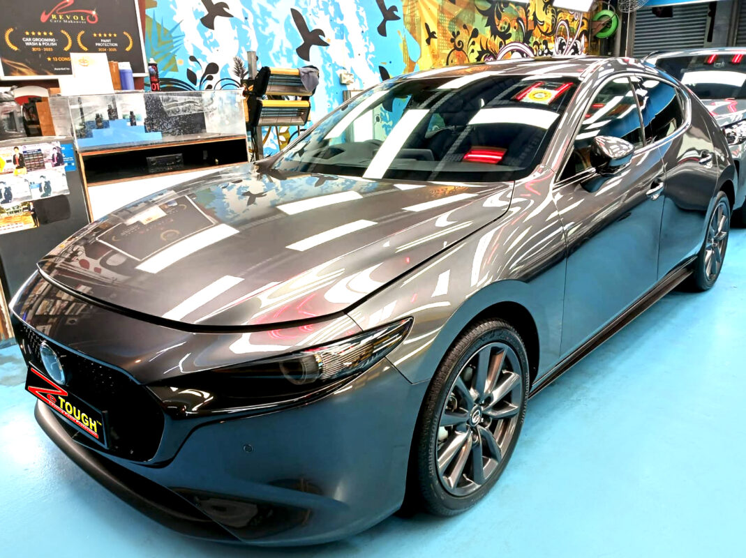 Mazda 3, glossy after its ZeTough Ceramic coating.