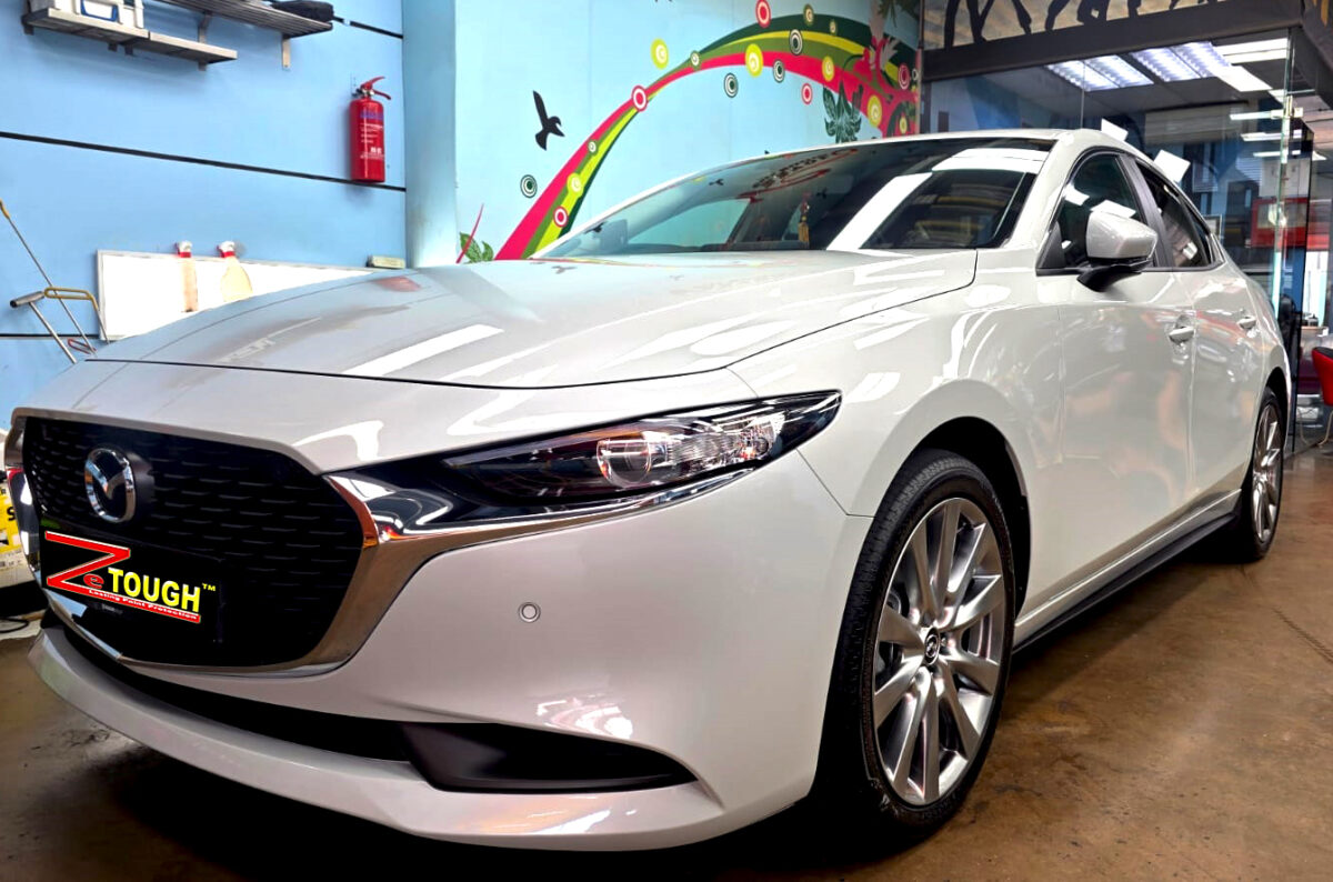 Mazda 3, glossy after its ZeTough Titanium coating.