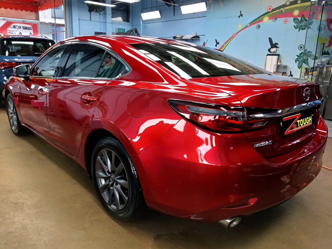 Rear quarter of the Mazda 6, glossy and protected.