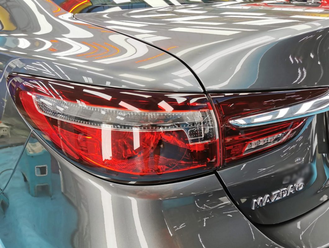 Rear quarter of the Mazda 6, glossy and protected.