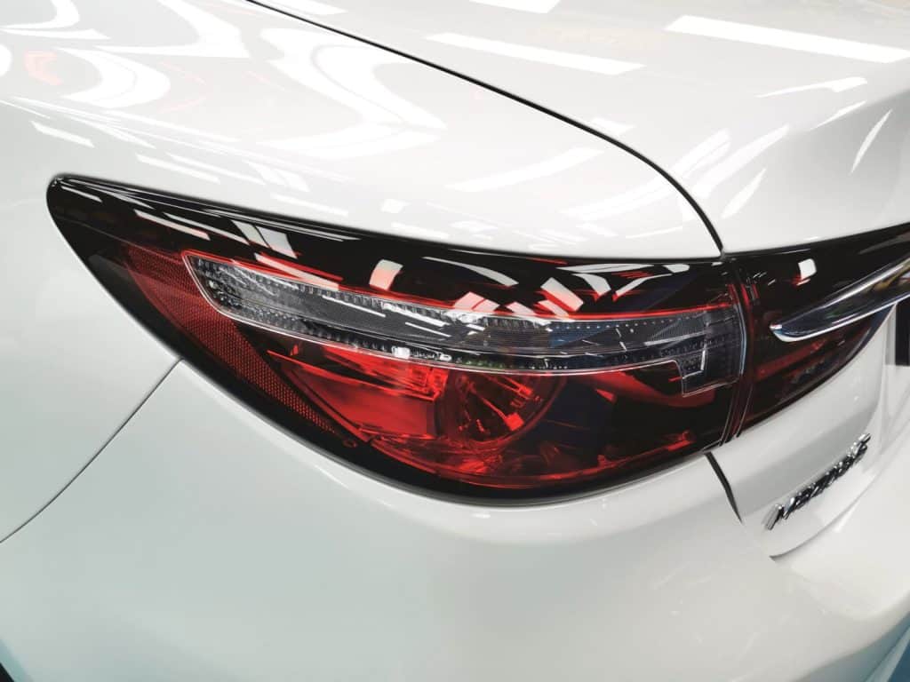 Rear quarter of the Mazda 6, glossy and protected.