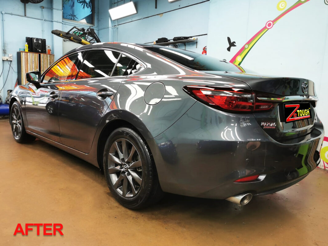 The Mazda 6 reassembled after painting, parts refitted.