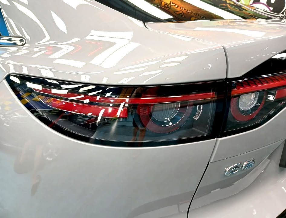 Close-up of the Mazda 6e tail light and rear quarter with the 6e badge.