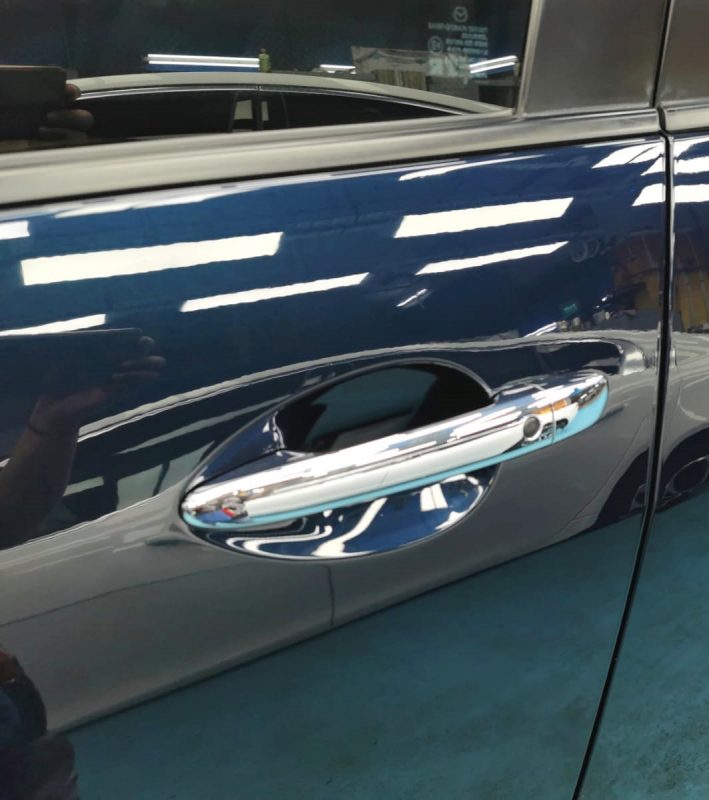 Front three-quarter view of the Mazda Biante after coating.