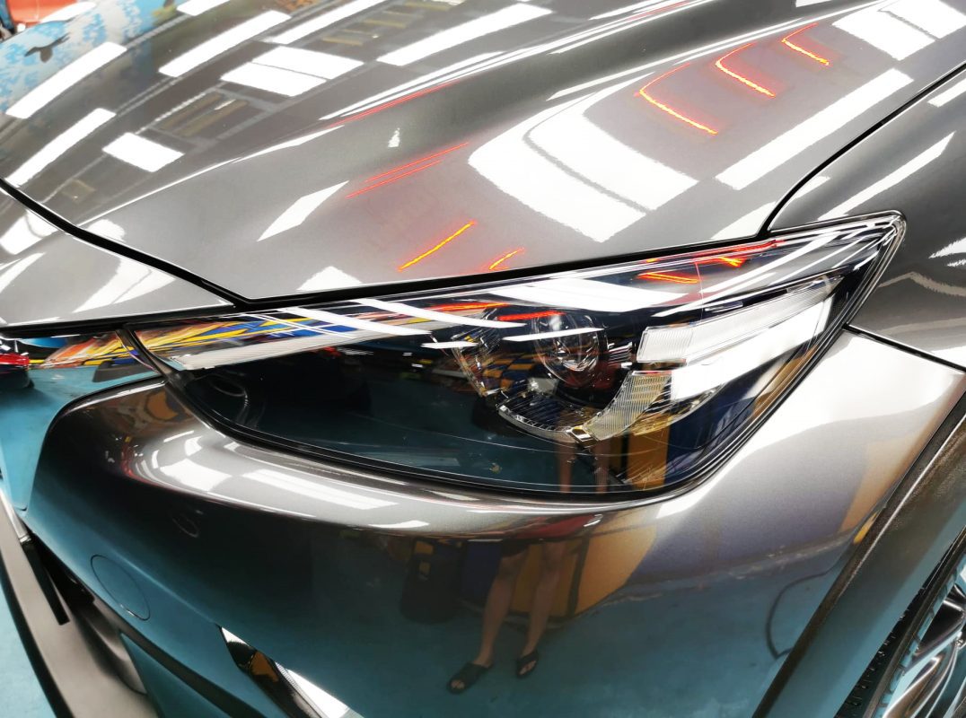 The CX-3's coated paintwork showing clean reflections.