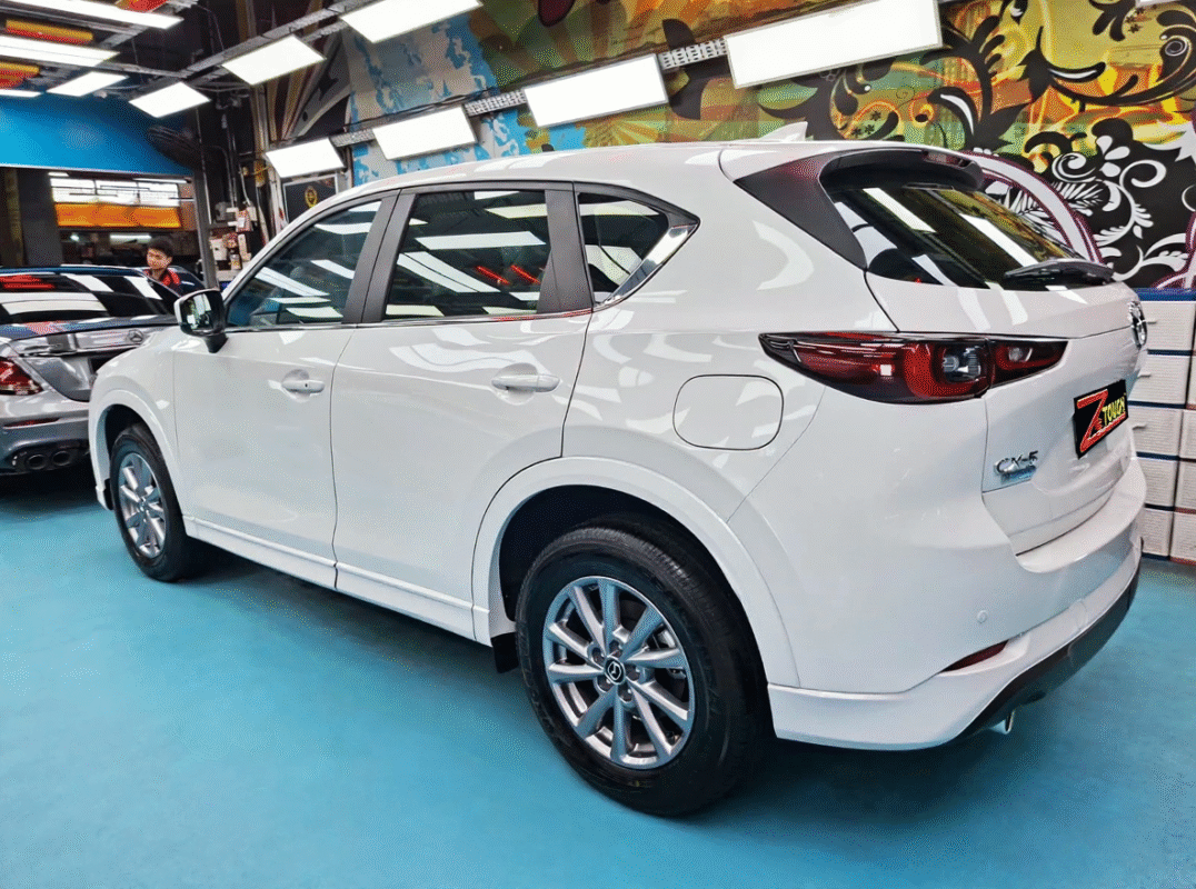 Rear quarter of the Mazda CX-5, glossy and protected.