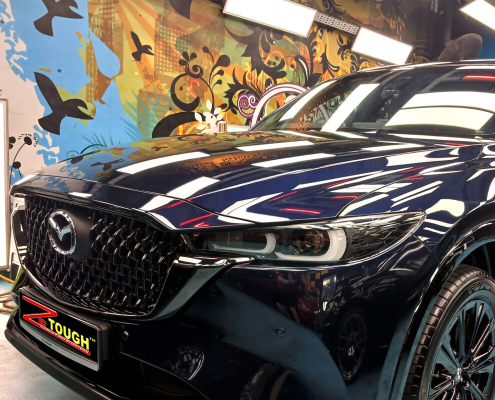 The Mazda CX-5 from a side angle after the ceramic coating.