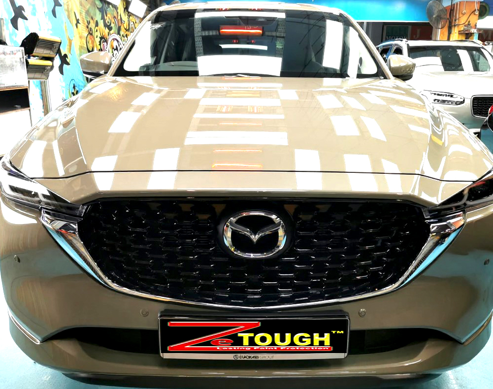 The Mazda CX-5 from a side angle after the ceramic coating.