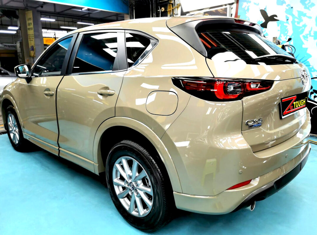 Rear quarter of the Mazda CX-5, glossy and protected.