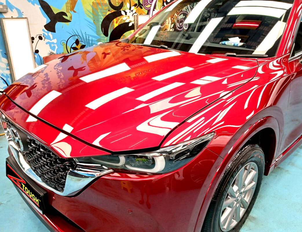 The Mazda CX-5 from a side angle after the ceramic coating.