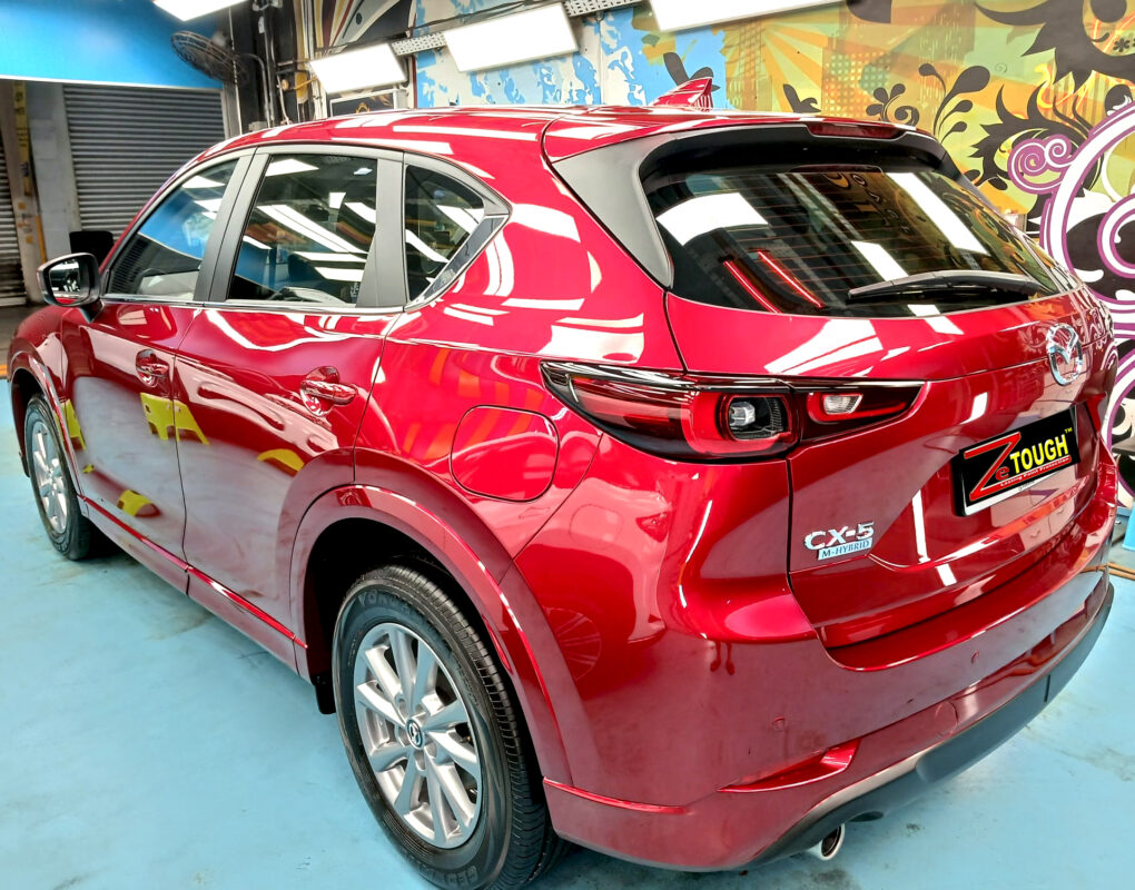 Rear quarter of the Mazda CX-5, glossy and protected.