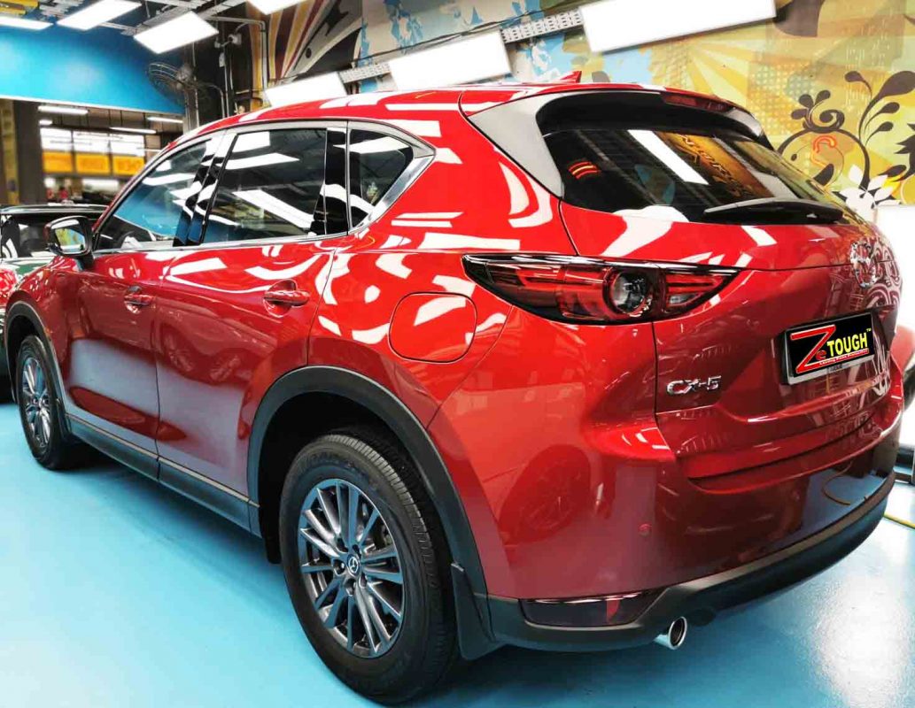 Rear quarter of the Mazda CX-5, glossy and protected.