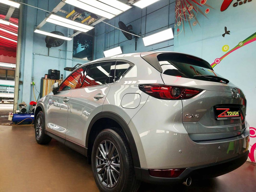 Rear quarter of the Mazda CX-5, glossy and protected.