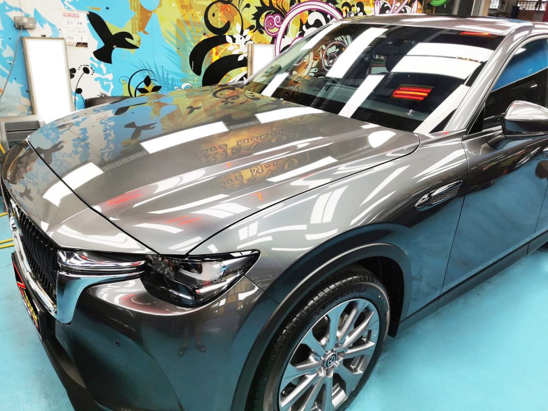 The Mazda CX-60 from a side angle after the titanium coating.