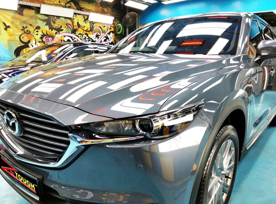 The Mazda CX-8 from a side angle after the ceramic coating.