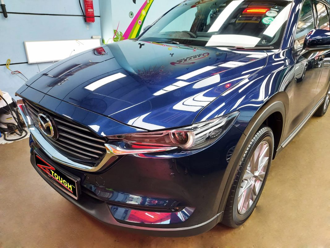 The Mazda CX-8 from a side angle after the ceramic coating.
