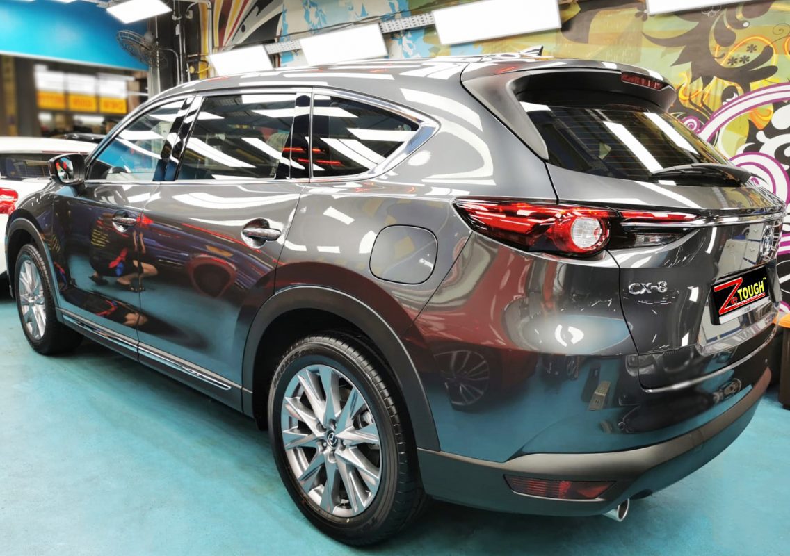 Rear quarter of the Mazda CX-8, glossy and protected.