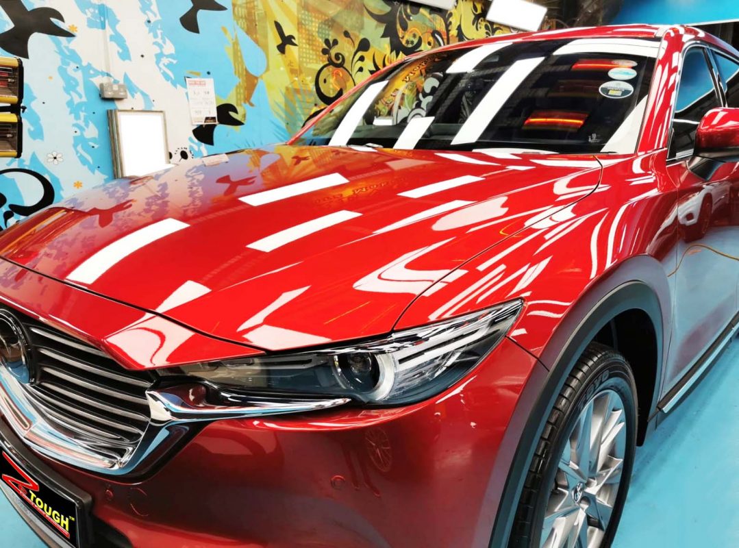 The Mazda CX-8 from a side angle after the ceramic coating.