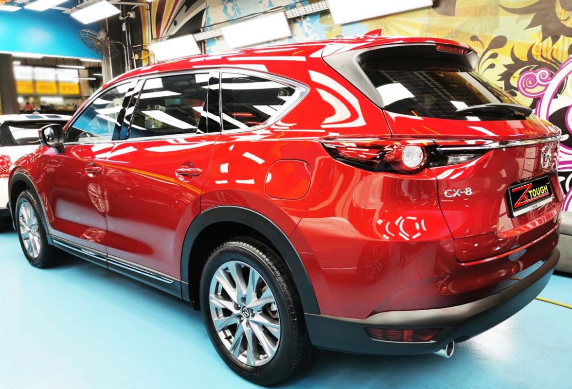Rear quarter of the CX-8, glossy and protected.