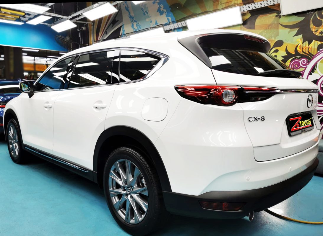 Rear quarter of the Mazda CX-8, glossy and protected.