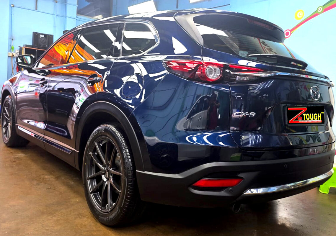 Rear quarter of the Mazda CX-9, glossy and protected.