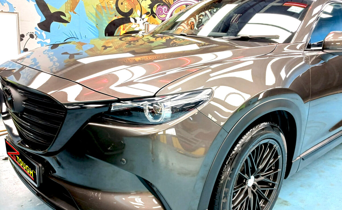 The Mazda CX-9 from a side angle after the titanium coating.