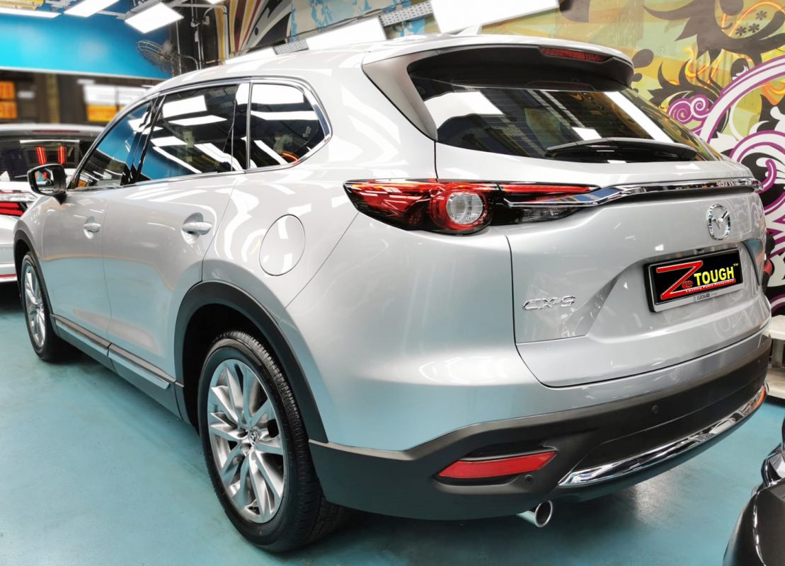 Rear quarter of the Mazda CX-9, glossy and protected.