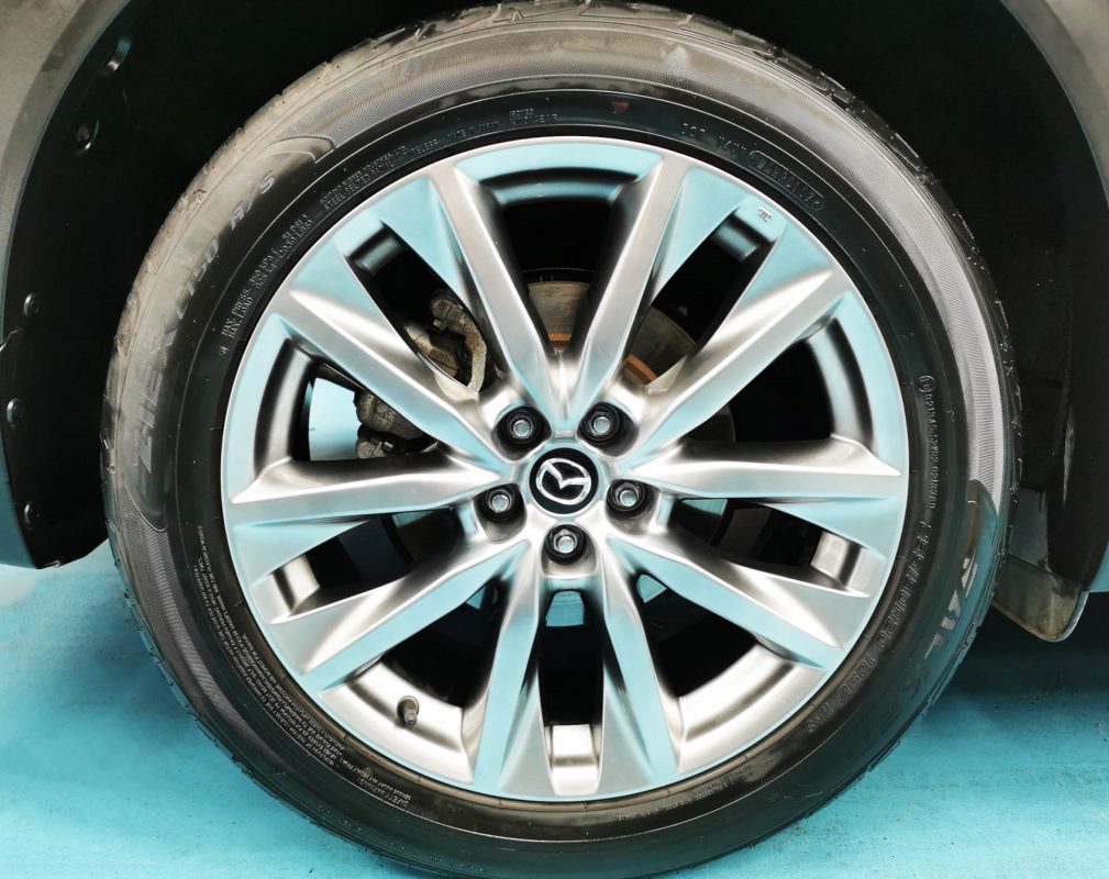 Wheel and arch detail on the Mazda CX-9 after coating.