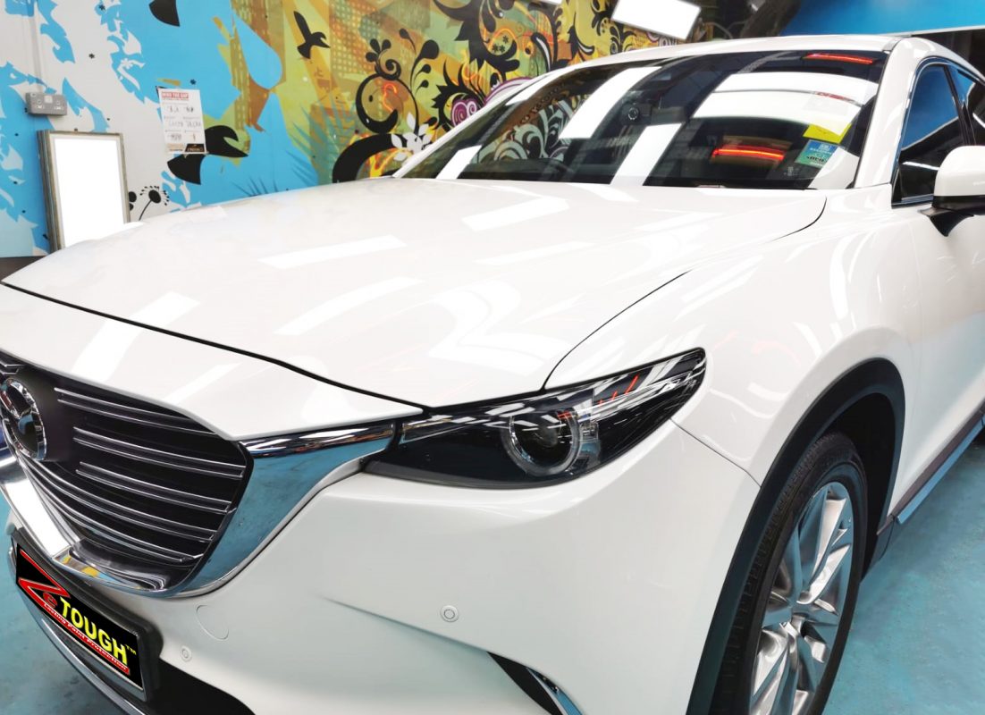 The Mazda CX-9 from a side angle after the titanium coating.