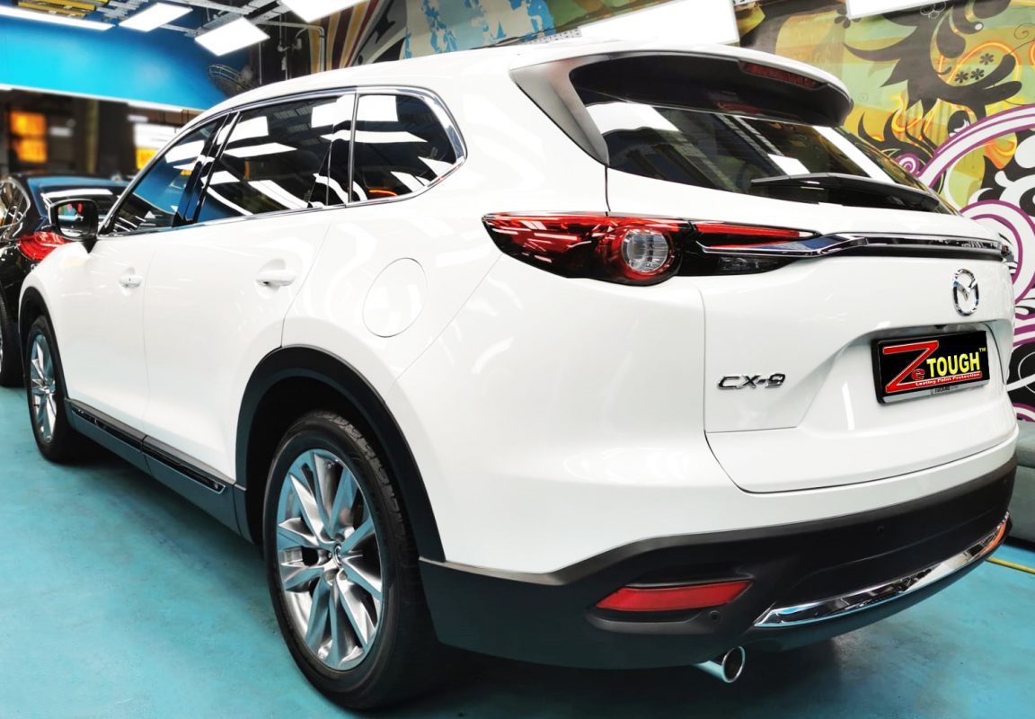 Rear quarter of the Mazda CX-9, glossy and protected.