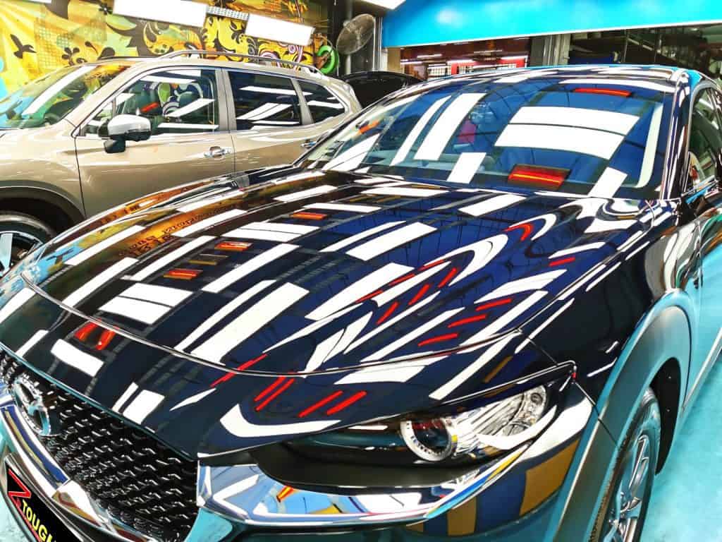 The Mazda CX-3 from a side angle after the titanium coating.